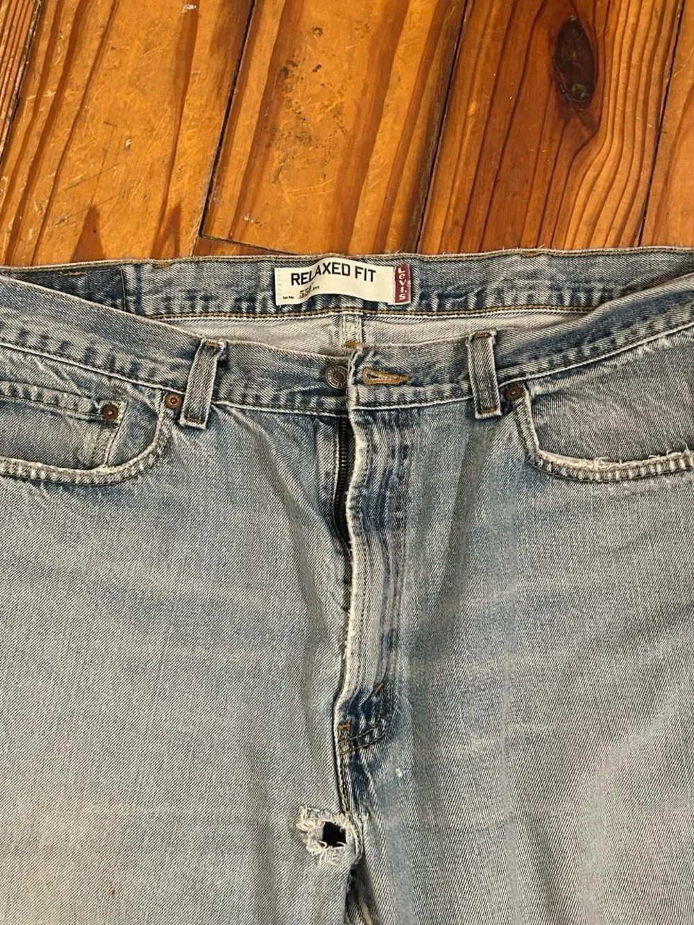 Vintage Levi's Light Blue Distressed Thrashed Relaxed Fit Jeans